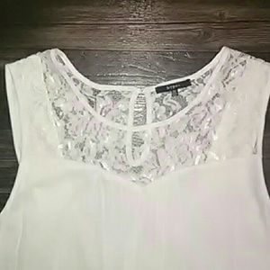 White knee length dress